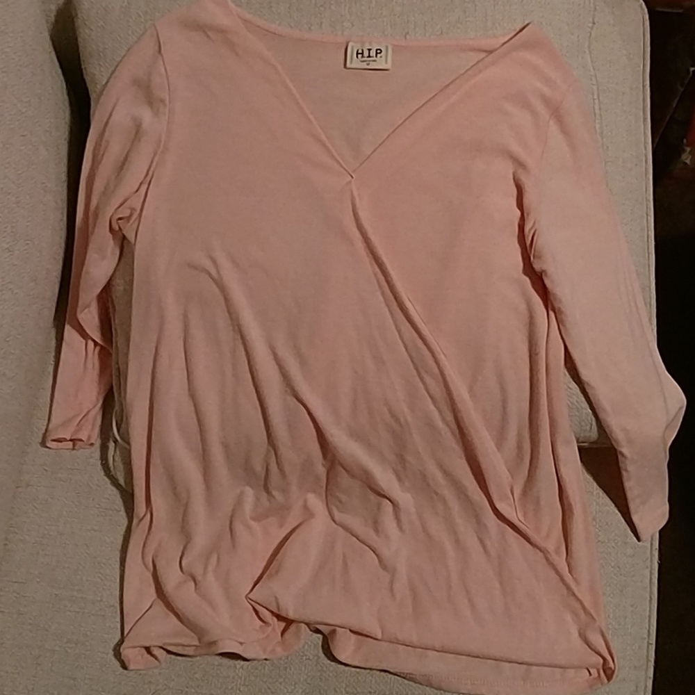 A womans quarter sleeve shirt